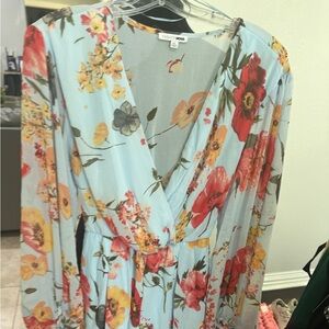 Women light blue, floral romper. Size XL. Brand new.